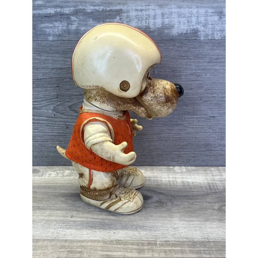 1977 Creative Mfg Orange Football Player Hound Dog Plastic Coin Bank Vintage 70s